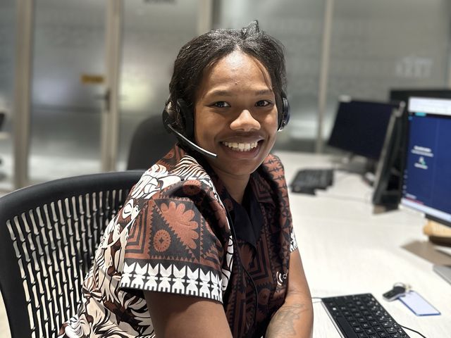 Centrecom team member ready to help at her desk in Fiji